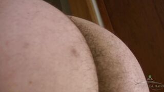 Marie strips and tries on different outfits in the laundry room, while showing off her hairy ass and fluffy pussy